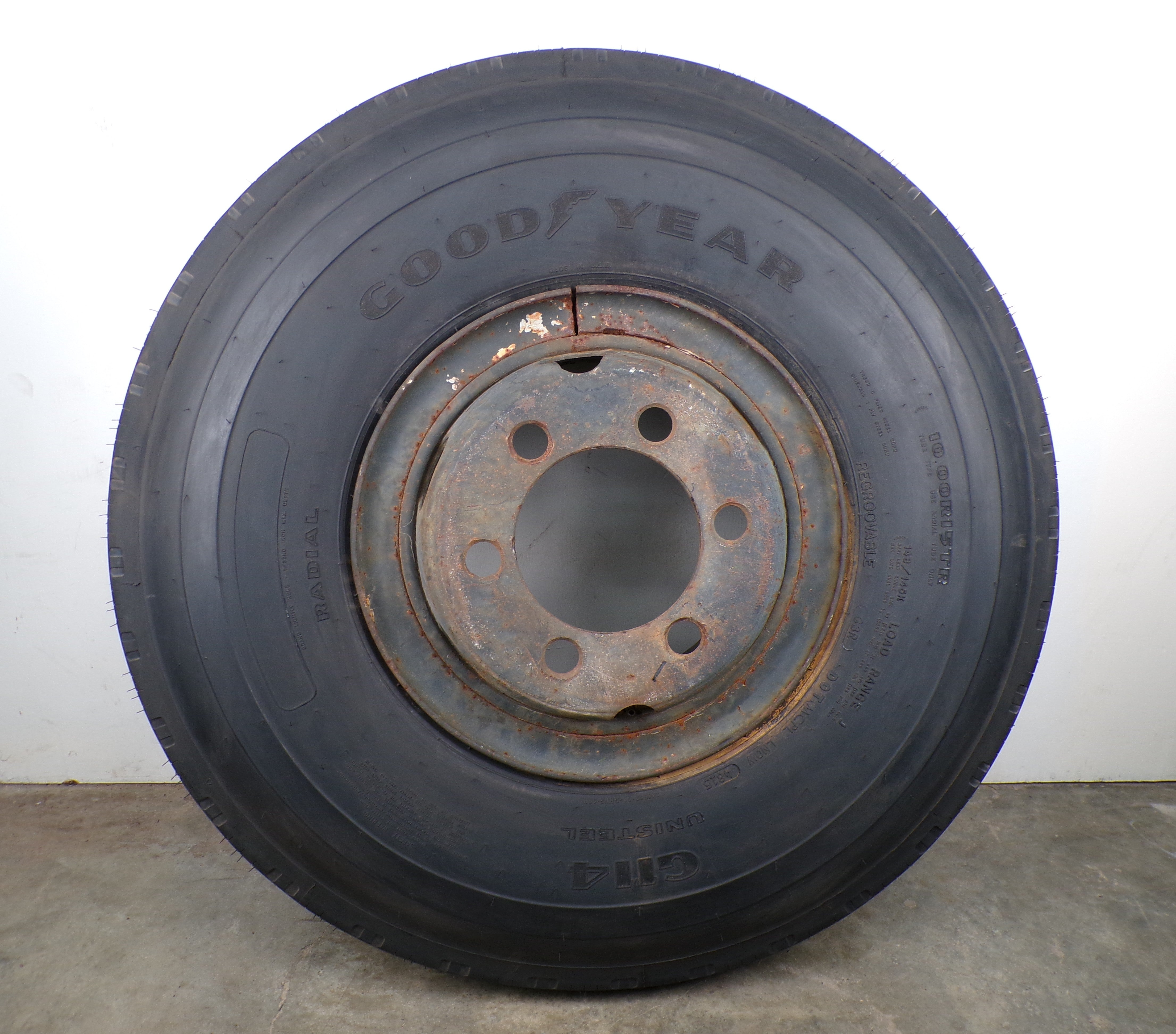10.00R15 Goodyear G114 New on 6 hole used wheel