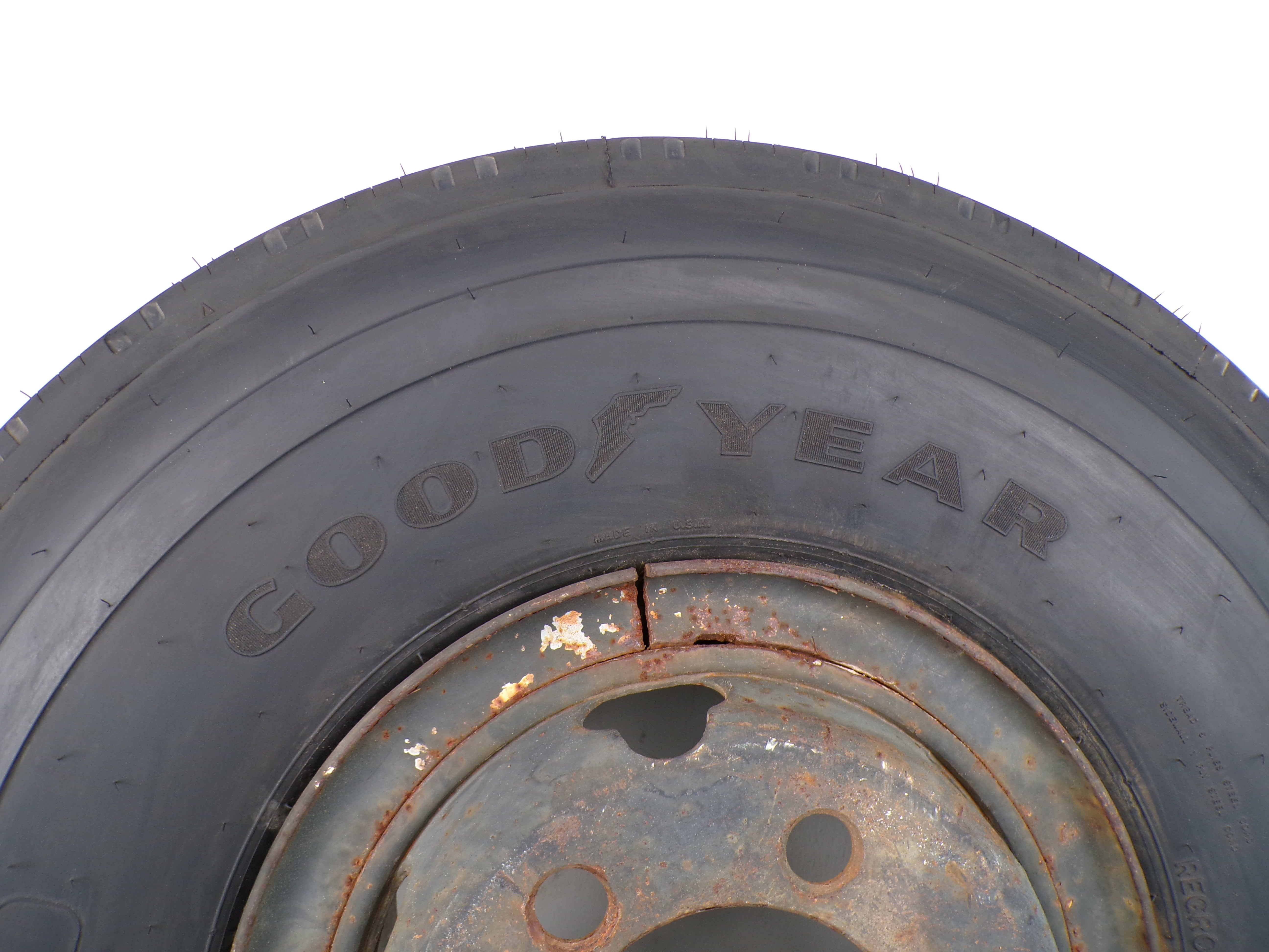10.00R15 Goodyear G114 New on 6 hole used wheel