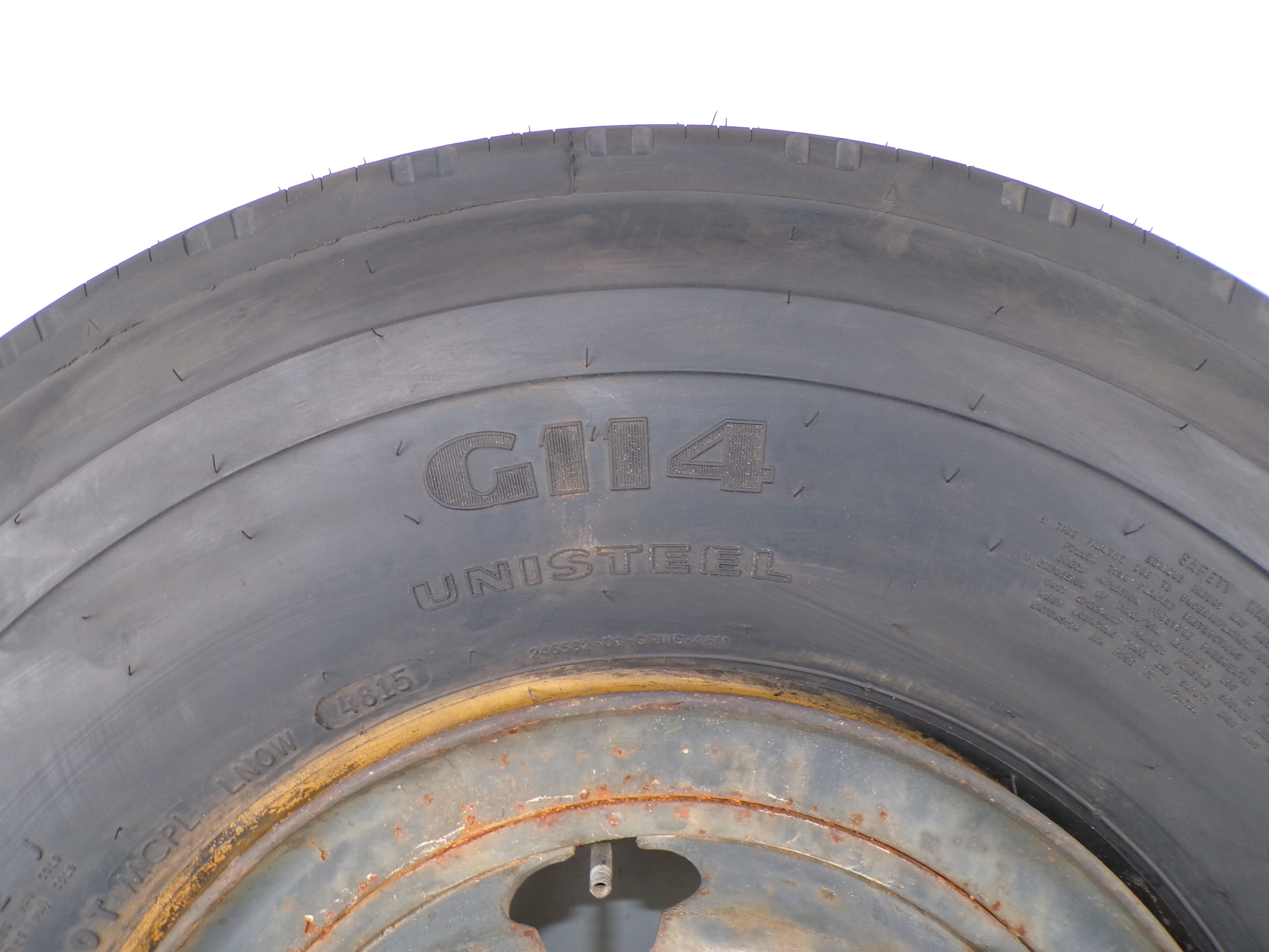10.00R15 Goodyear G114 New on 6 hole used wheel