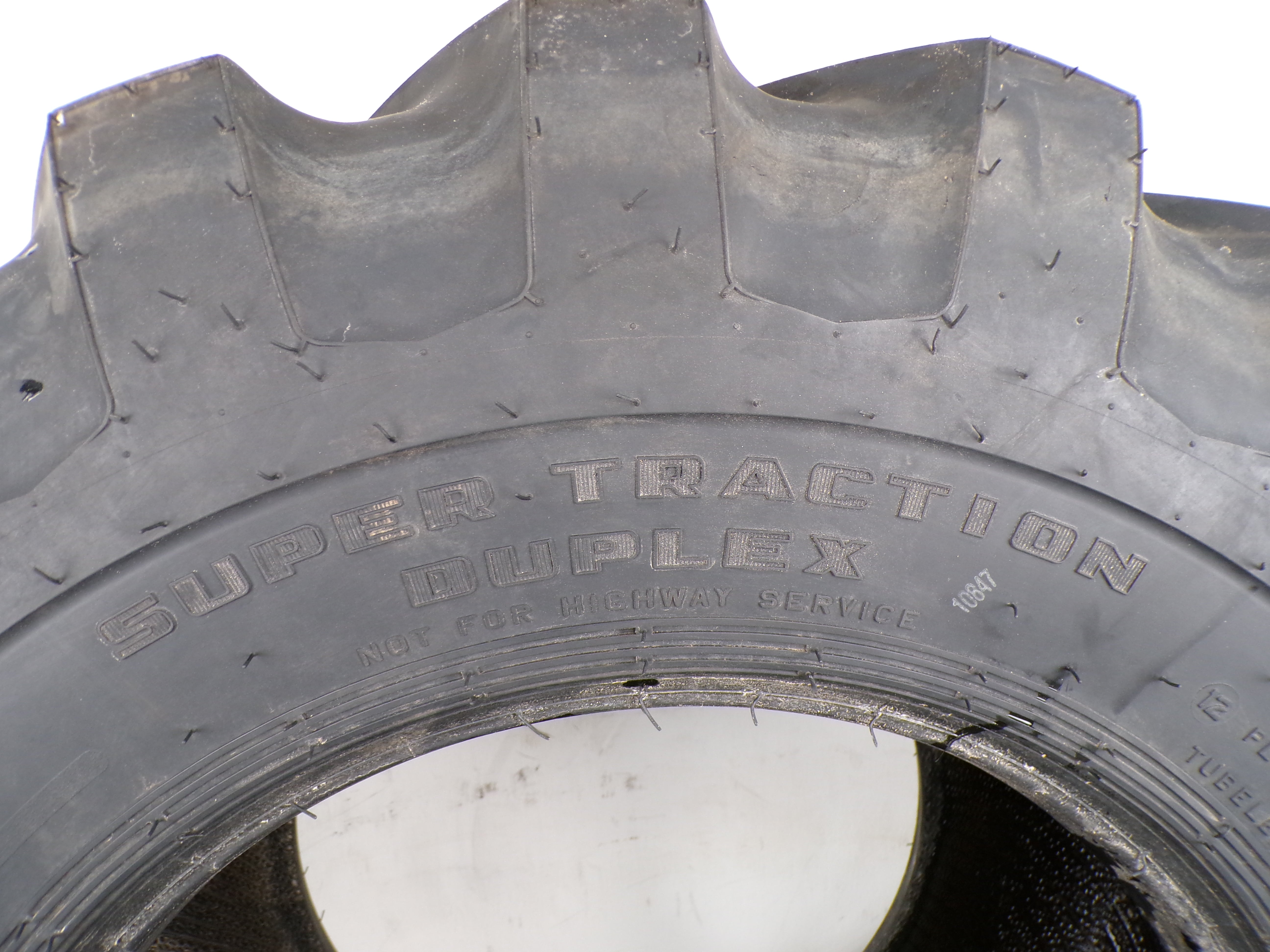 15-19.5 Firestone Super Traction Duple X