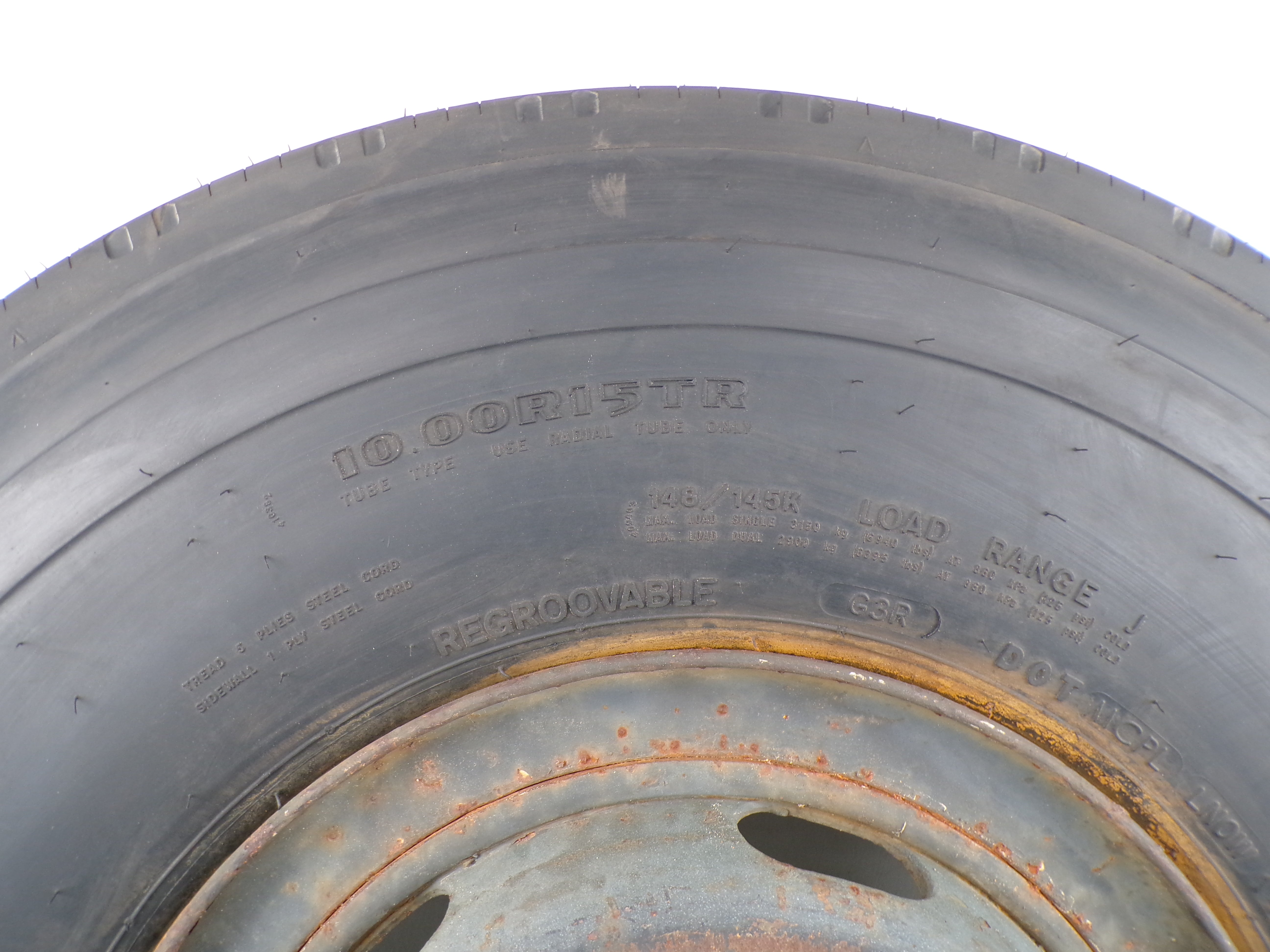 10.00R15 Goodyear G114 New on 6 hole used wheel