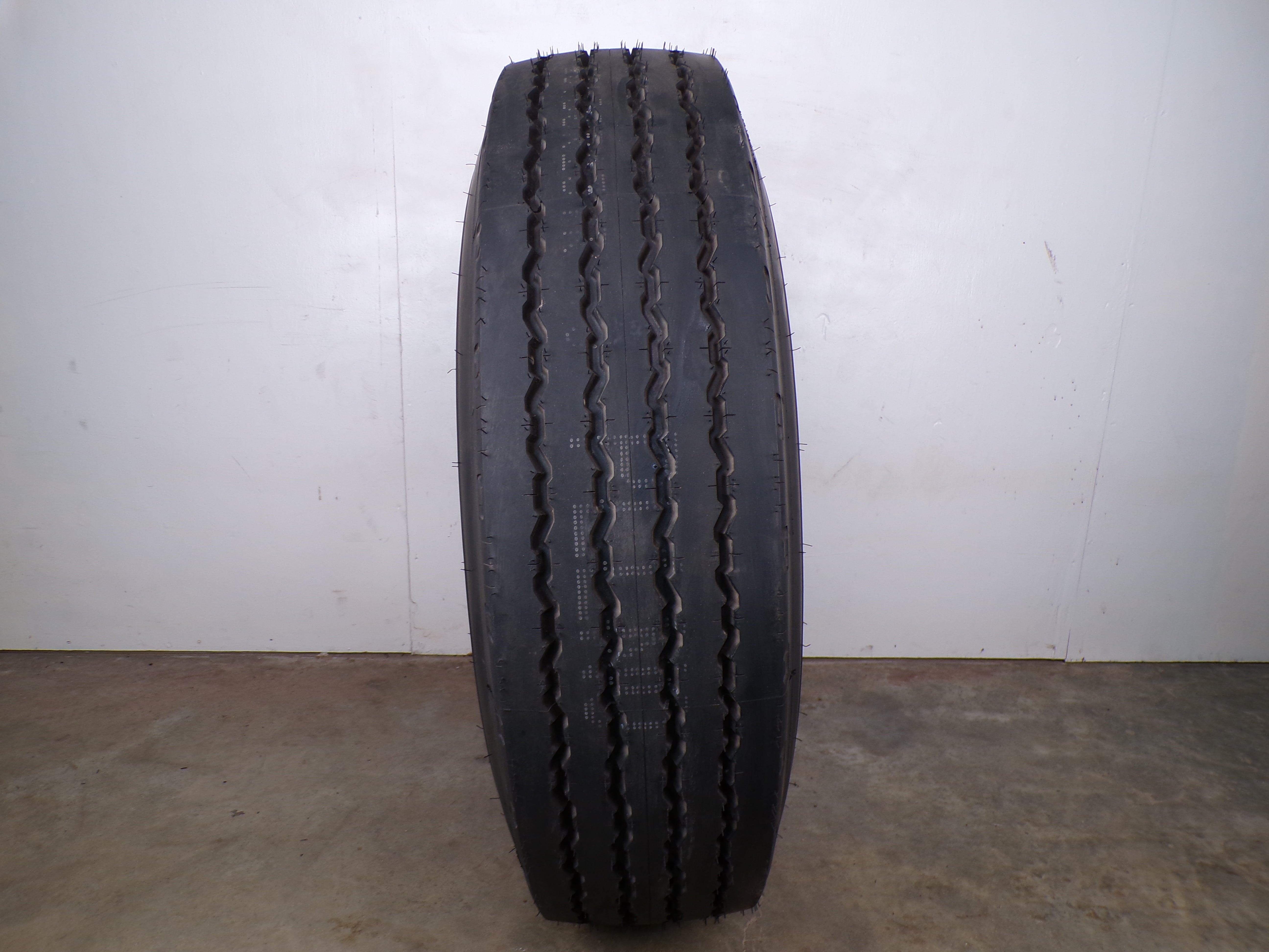 10.00R15 Goodyear G114 New on 6 hole used wheel
