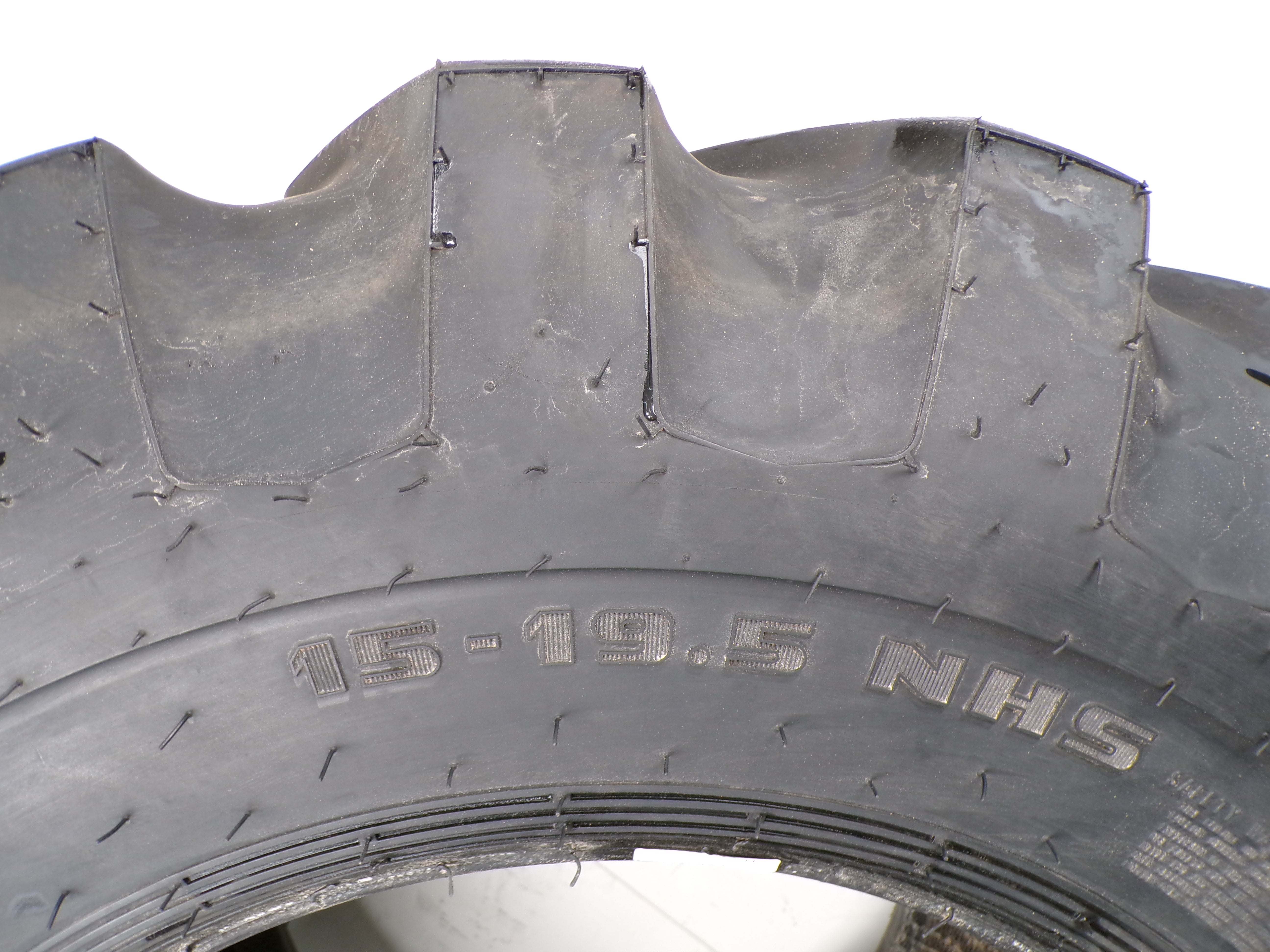 15-19.5 Firestone Super Traction Duple X